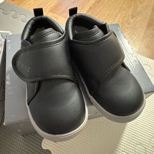Stonz Black Sneakers with Casual Slip-On Style and Rounded Toe